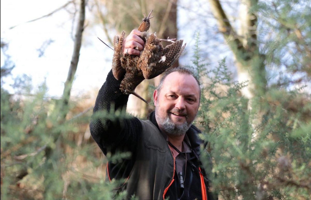 Chasseur avec une bécasse